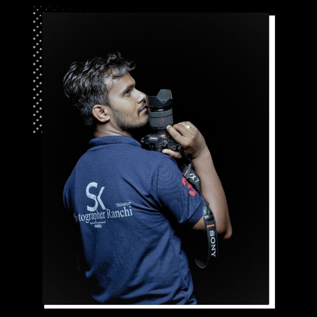 Sujeet Kumar, Wedding Photographer in Ranchi Founder of SK Photographer Ranchi holding camera portrait