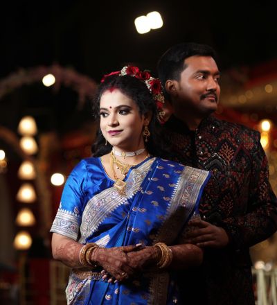 "Elegant couple portrait at an Indian wedding reception in traditional attire, captured by SK Photographer Ranchi, premium reception photography in Jharkhand."